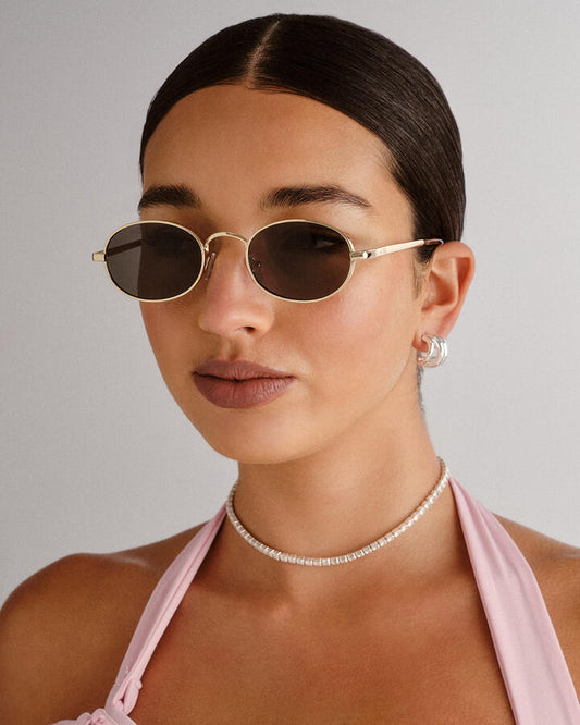 Image of Sunglasses. Productname: Aire Regulus Sunglasses: Gold - Women's Sunglasses in Metallic colour by brand - Novo