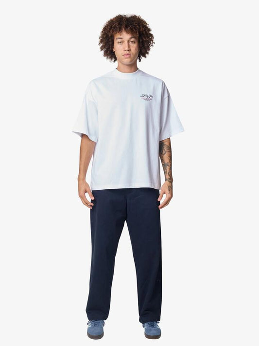 Image of a model wearing Tops. Productname: TNE Miami Motion Tee in Optic White colour by brand - TNE