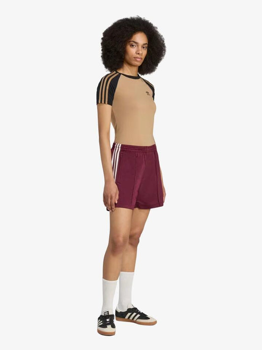 Image of a model wearing Shorts. Productname: Adidas Firebird Short in Maroon/Cream White colour by brand - Adidas