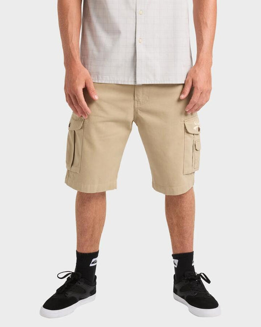 Image of a model wearing Shorts. Product name - Quiksilver Mens Critical Battle Cargo Shorts Sandstone in Sandstone colour by brand - Quiksilver