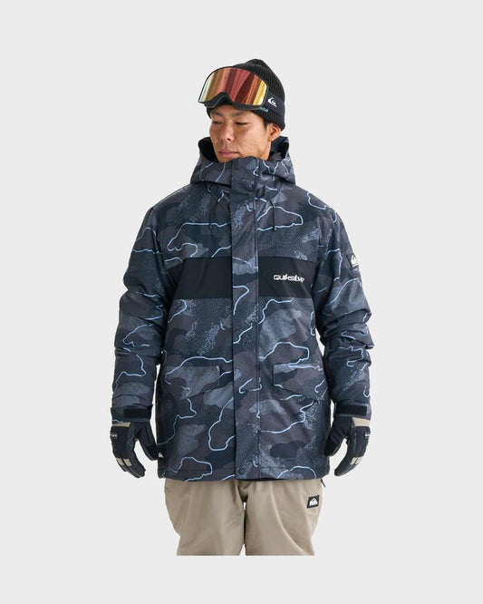 Image of a model wearing Outerwear. Productname: Quiksilver Mens Mission Printed Block Snow Jacket Camostrokes True Black - in Camostrokes True Black colour by brand - Quiksilver
