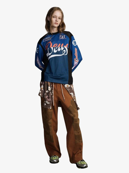 Image of a model wearing Tops. Productname: Deus Moss Gather Moto in Blue Light colour by brand - Deus