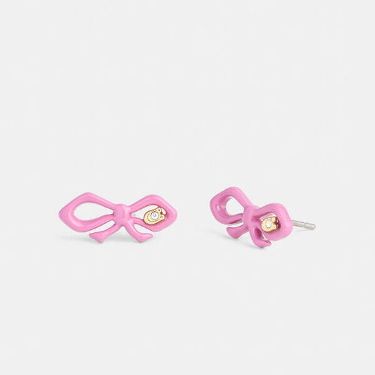 Image of Earrings. Productname: Resin Mini Bow Stud Earrings in GOLD/PINK colour by brand - Coach Outlet Australia