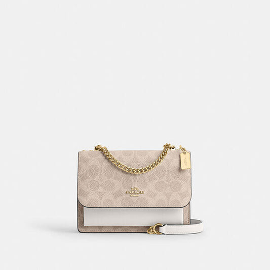 Image of Bags. Productname: Mini Klare Crossbody Bag In Signature Canvas in IM/SAND/CHALK colour by brand - Coach Outlet Australia