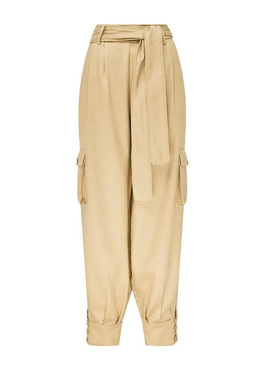 Image of a model wearing Pants. Productname: Rita Pants Beige | MOS The Label in Classic Beige colour by brand - MOS The Label