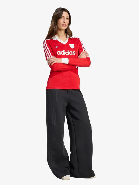 Image of a model wearing Tops. Productname: Adidas Graphic Football Long Sleeve Jersey in Better Scarlet colour by brand - Adidas