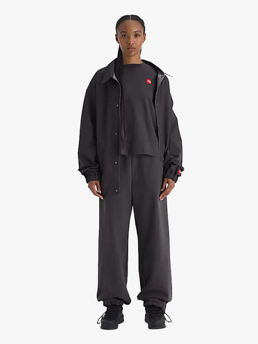 Image of a model wearing Tops. Productname: The North Face Womenâs Red Box Boxy Tee in Black colour by brand - The North Face