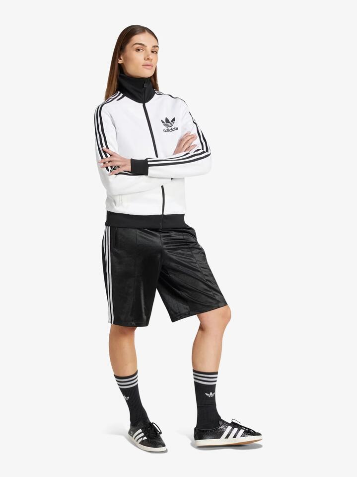 Image of a model wearing Shorts. Productname: Adidas Firebird Long Shorts in black/white colour by brand - Adidas