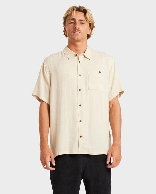 Image of a model wearing Tops. Productname: Billabong - Mens Ricardo Short Sleeve Shirt - Chino - in Chino colour by brand - Billabong