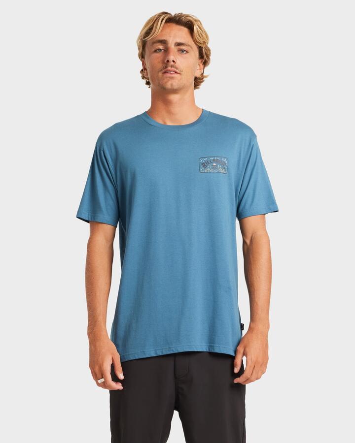 Image of a model wearing Tops. Productname: Billabong - Mens Scenic Arch Adiv T-Shirt - Real Teal - in Real Teal colour by brand - Billabong