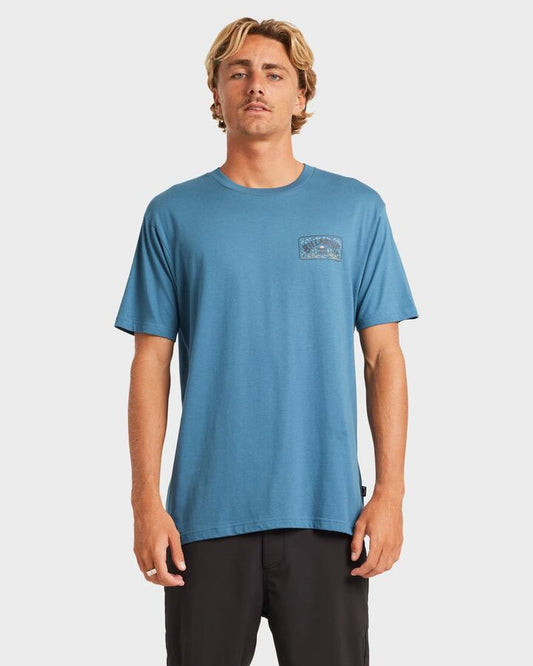 Image of a model wearing Tops. Productname: Billabong - Mens Scenic Arch Adiv T-Shirt - Real Teal - in Real Teal colour by brand - Billabong