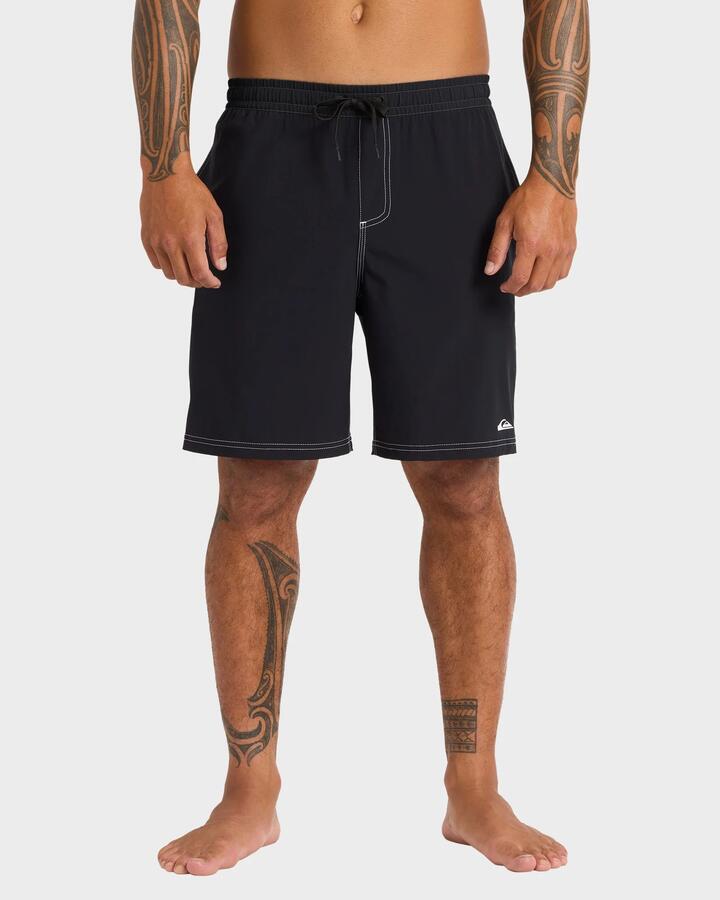 Image of a model wearing Shorts. Product name - Quiksilver Mens Pu-Tawhiro 20" Swim Shorts Black in Black colour by brand - Quiksilver