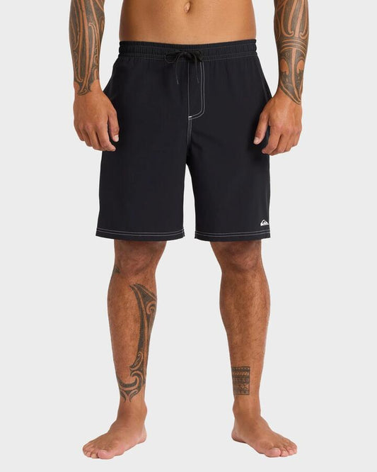 Image of a model wearing Shorts. Productname: Quiksilver Mens Pu-Tawhiro 20" Swim Shorts Black - in Black colour by brand - Quiksilver