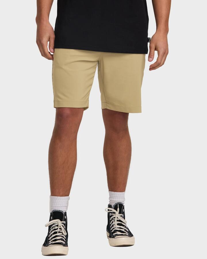 Image of a model wearing Shorts. Product name - Billabong Mens Surftrek Journey Hybrid Walkshorts Gravel in Gravel colour by brand - Billabong