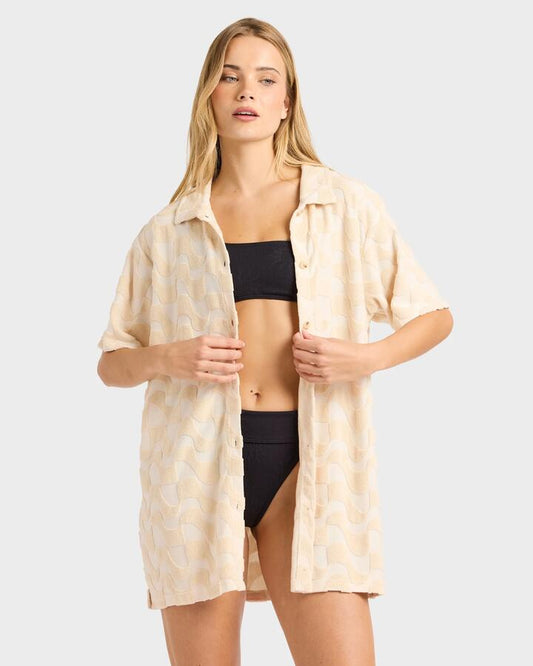 Image of a model wearing Tops. Productname: Billabong - Womens Laura Waves Long Sleeve Shirt - Antique White - in Antique White colour by brand - Billabong