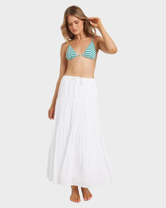Image of a model wearing Skirts. Productname: Billabong - Womens High Tides Maxi Skirt - White - in White colour by brand - Billabong