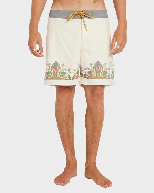 Image of a model wearing Shorts. Productname: RVCA Mens Mel G 17" Hybrid Shorts Ceramic - in Ceramic colour by brand - RVCA