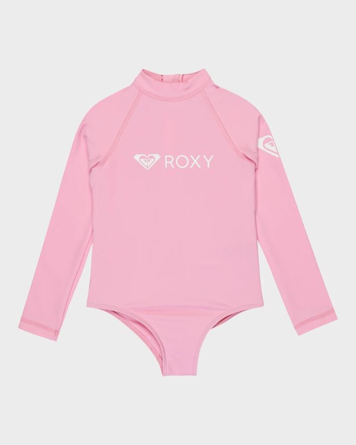 Image of a model wearing Tops. Product name - Roxy Girls 2-7 Heater Long Sleeve One Piece Rash Vest Bonbon in Bonbon colour by brand - Roxy