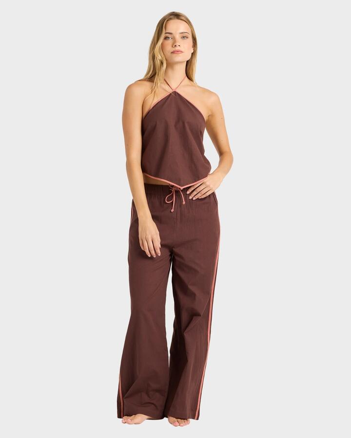 Image of a model wearing Pants. Product name - Billabong Womens Coastal Crush Elastic Waist Pants Teak in Teak colour by brand - Billabong