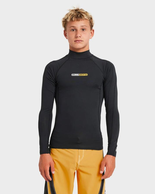 Image of a model wearing Tops. Productname: Billabong Boys 8-16 Spec Long Sleeve Rash Vest Black - in Black colour by brand - Billabong