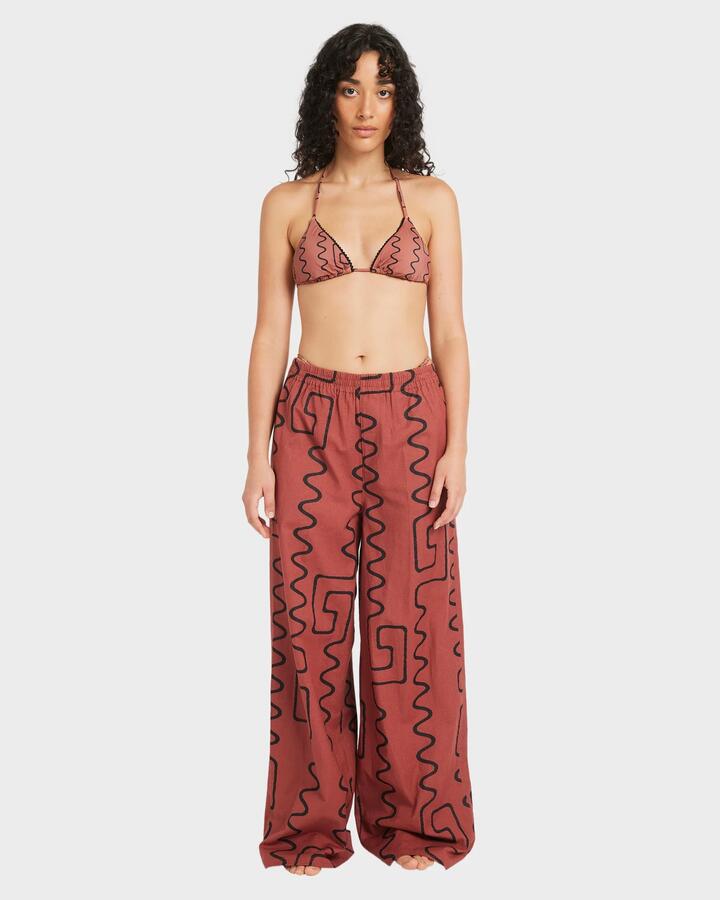 Image of a model wearing Pants. Product name - RVCA Womens Farlow Elastic Elastic Waist Pants Mahogany in Mahogany colour by brand - RVCA
