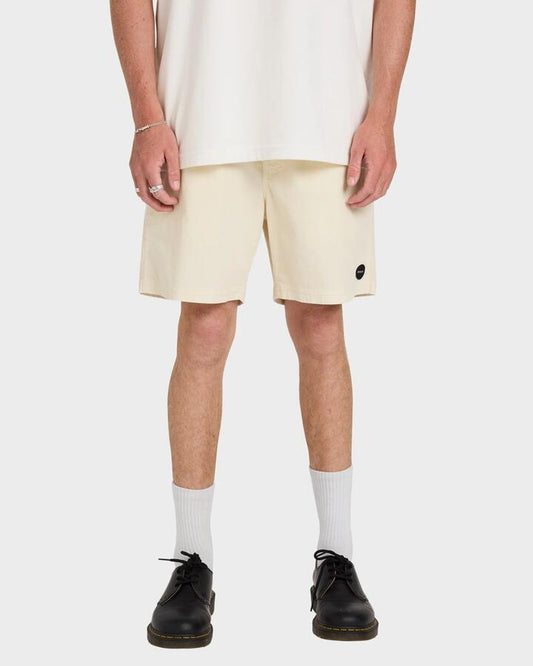 Image of a model wearing Shorts. Product name - RVCA Mens Escape Elastic Cord Ii Walkshorts Latte in Latte colour by brand - RVCA