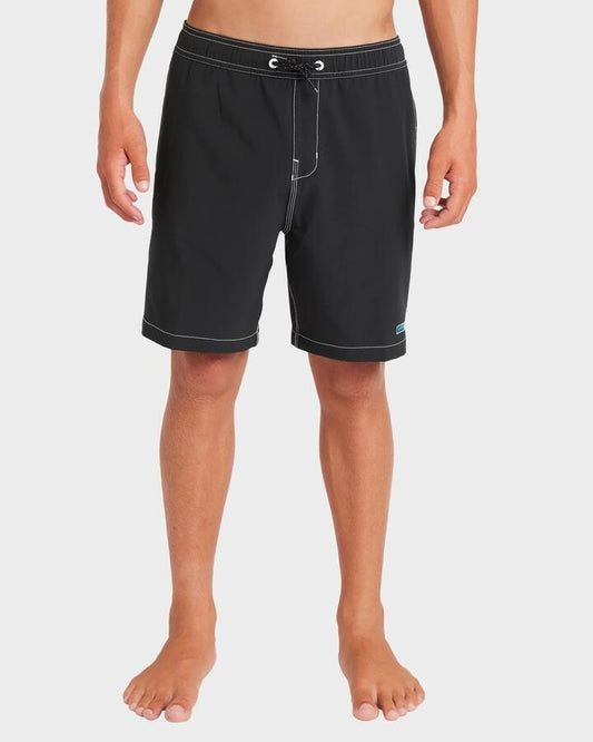 Image of a model wearing Shorts. Productname: Billabong Boys 8-16 Bong Fly 19" Swim Shorts Black - in Black colour by brand - Billabong