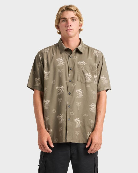 Image of a model wearing Tops. Productname: Quiksilver - Mens Atoll Short Sleeve Shirt - Olive - in Olive colour by brand - Quiksilver