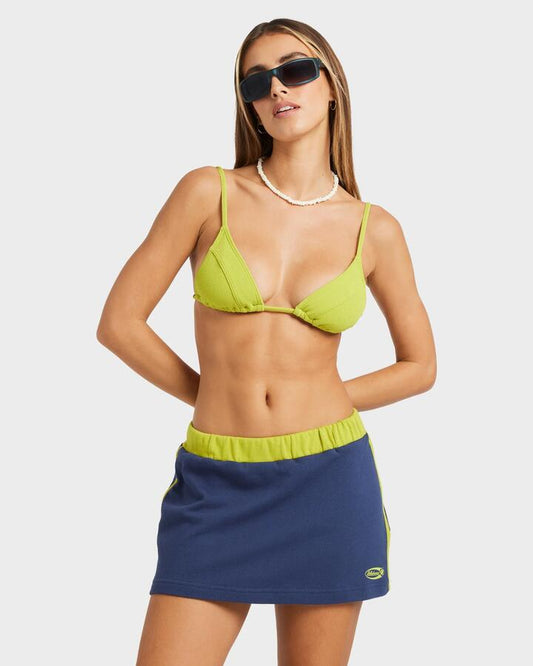 Image of a model wearing Skirts. Product name - Billabong Womens Billa Crush Mini Skirt Celestial Blue in Celestial Blue colour by brand - Billabong
