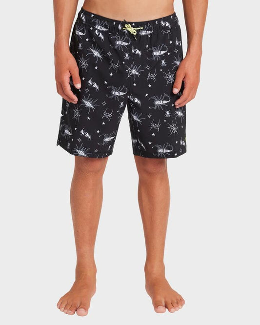 Image of a model wearing Shorts. Productname: Billabong Boys 8-16 Creatures 13" Swim Shorts Black - in Black colour by brand - Billabong