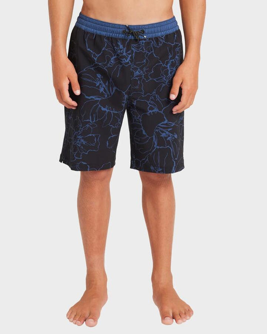 Image of a model wearing Shorts. Productname: Billabong Boys 8-16 Sundays 13" Swim Shorts Vintage Indigo - in Vintage Indigo colour by brand - Billabong