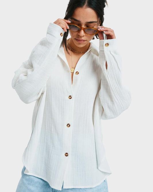 Image of a model wearing Tops. Productname: Roxy Womens Morning Long Sleeve Shirt Bright White - in Bright White colour by brand - Roxy