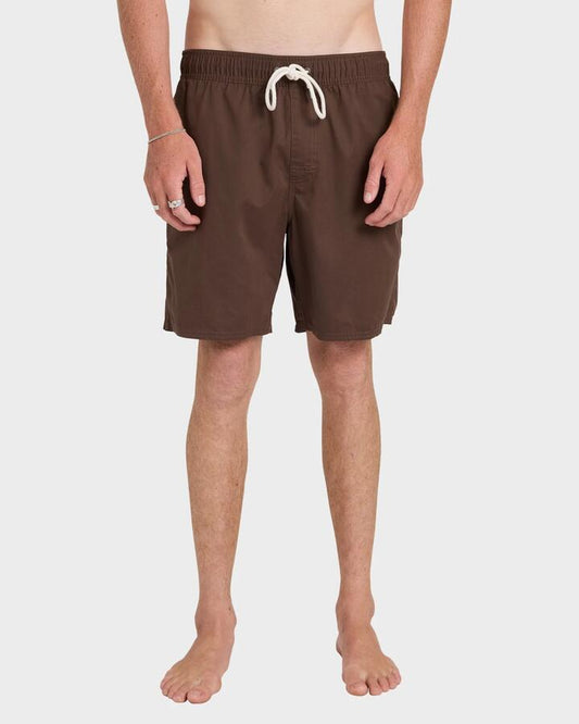 Image of a model wearing Shorts. Productname: RVCA Mens Opposites Elastic 2 Hybrid Shorts Mocha - in Mocha colour by brand - RVCA