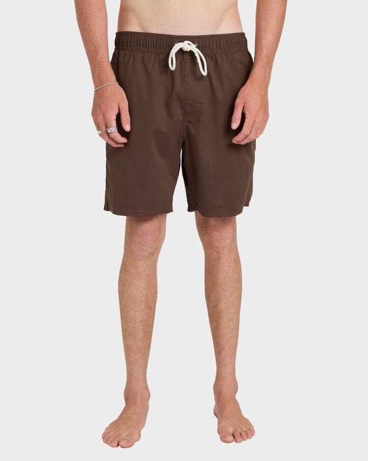 Image of a model wearing Shorts. Product name - RVCA Mens Opposites Elastic 2 Hybrid Shorts Mocha in Mocha colour by brand - RVCA
