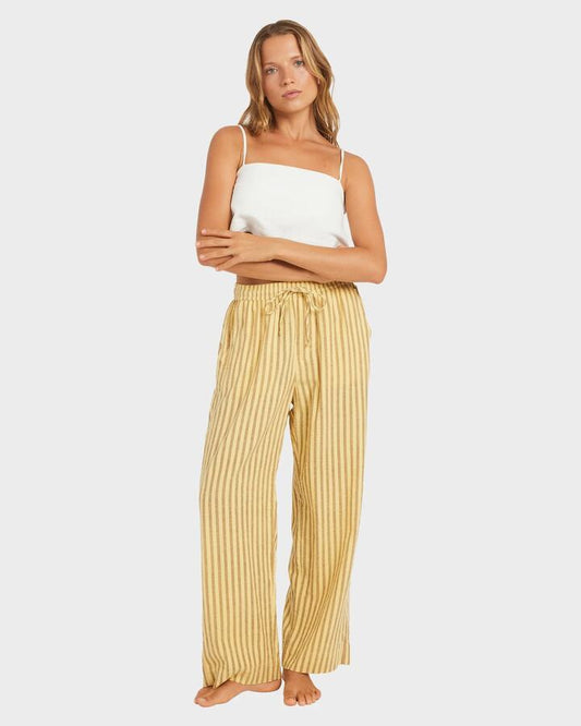 Image of a model wearing Pants. Productname: Roxy Womens Mercado Stripe Pants Butter - in Butter colour by brand - Roxy