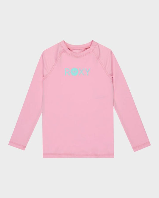Image of a model wearing Tops. Product name - Roxy Girls 2-7 Essential Long Sleeve Rash Vest Bonbon in Bonbon colour by brand - Roxy