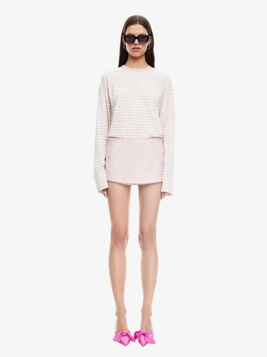 Image of a model wearing Skirts. Productname: Lioness Uncharted Skort in Soft Pink colour by brand - Lioness
