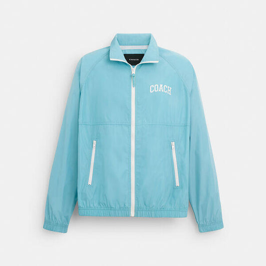 Image of a model wearing Outerwear. Productname: Track Jacket in FADED BLUE colour by brand - Coach Outlet Australia
