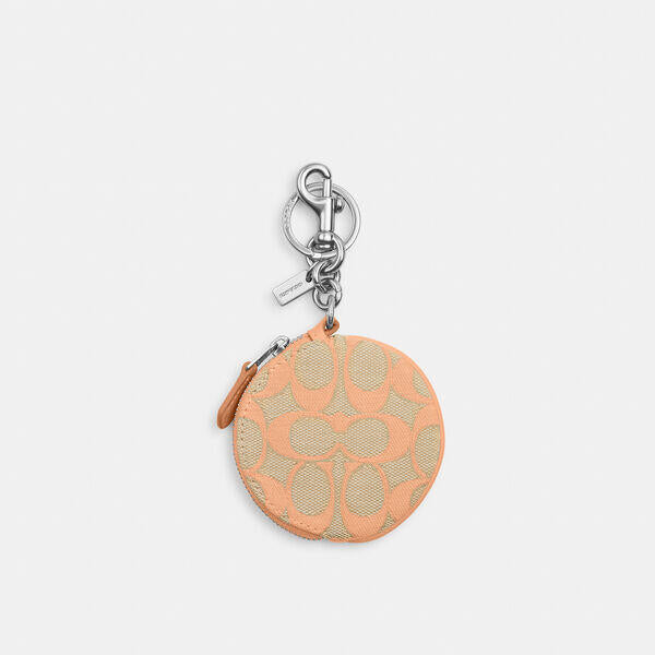 Image of Bags. Productname: Circular Coin Pouch In Signature Jacquard in FADED BLUSH colour by brand - Coach Outlet Australia