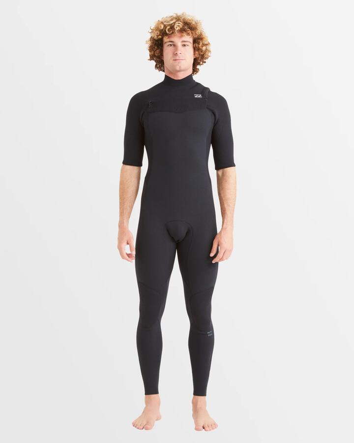 Image of a model wearing Tops. Productname: Billabong Mens 2/2Mm Revo Natural Chest Zip Fullsuit Black - in Black colour by brand - Billabong