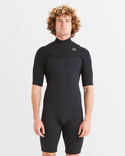 Image of a model wearing Tops. Productname: Billabong Mens 2/2Mm Revo Natural Chest Zip Springsuit Black - in Black colour by brand - Billabong