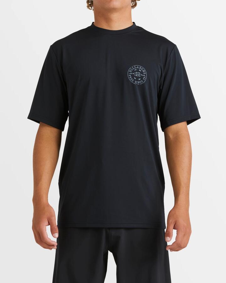 Image of a model wearing Tops. Product name - Billabong Mens Big Wave Daz Short Sleeve Rash Vest Black in Black colour by brand - Billabong