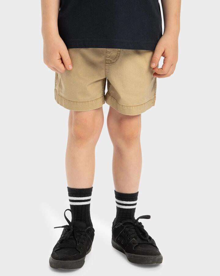 Image of a model wearing Shorts. Product name - Quiksilver Boys 2-7 Taxer Walkshorts Khaki in Khaki colour by brand - Quiksilver