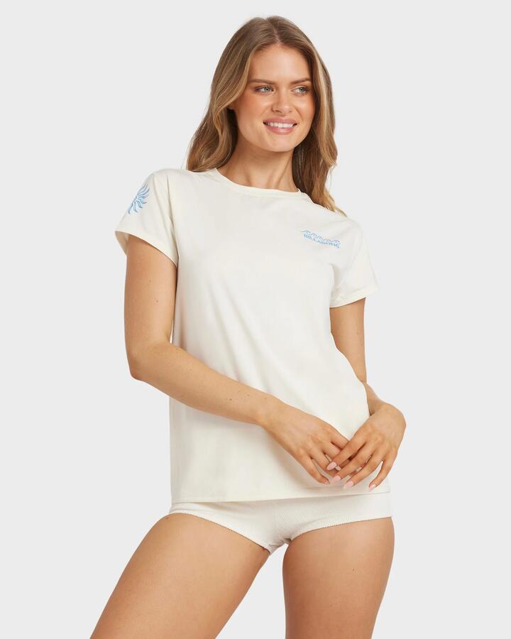 Image of a model wearing Tops. Productname: Billabong - Womens Find Me Sundays Short Sleeve Rash Vest - Salt Crystal - in Salt Crystal colour by brand - Billabong