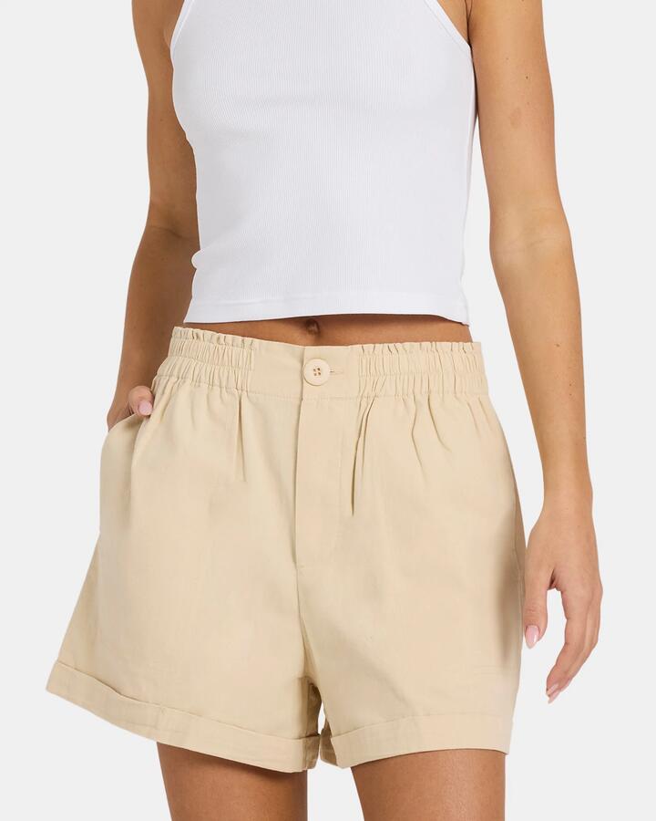 Image of a model wearing Shorts. Product name - Nunui Womens Alldays Shorts Natural in Natural colour by brand - Nunui