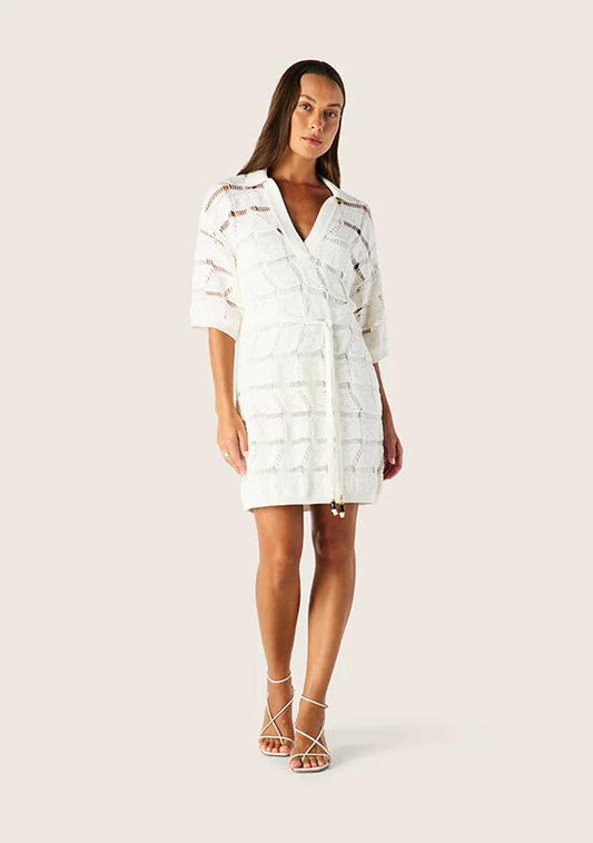 Image of a model wearing Dress. Productname: Clara Knit Kaftan Mini Dress in Optic White colour by brand - MOS The Label