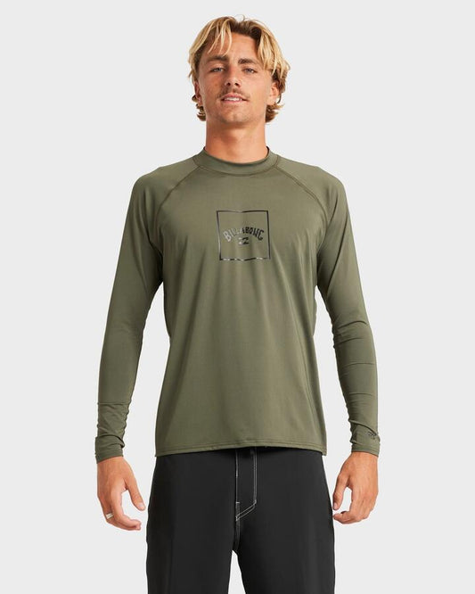 Image of a model wearing Tops. Productname: Billabong - Mens Boxed Arch Long Sleeve Rash Vest - Military - in Military colour by brand - Billabong