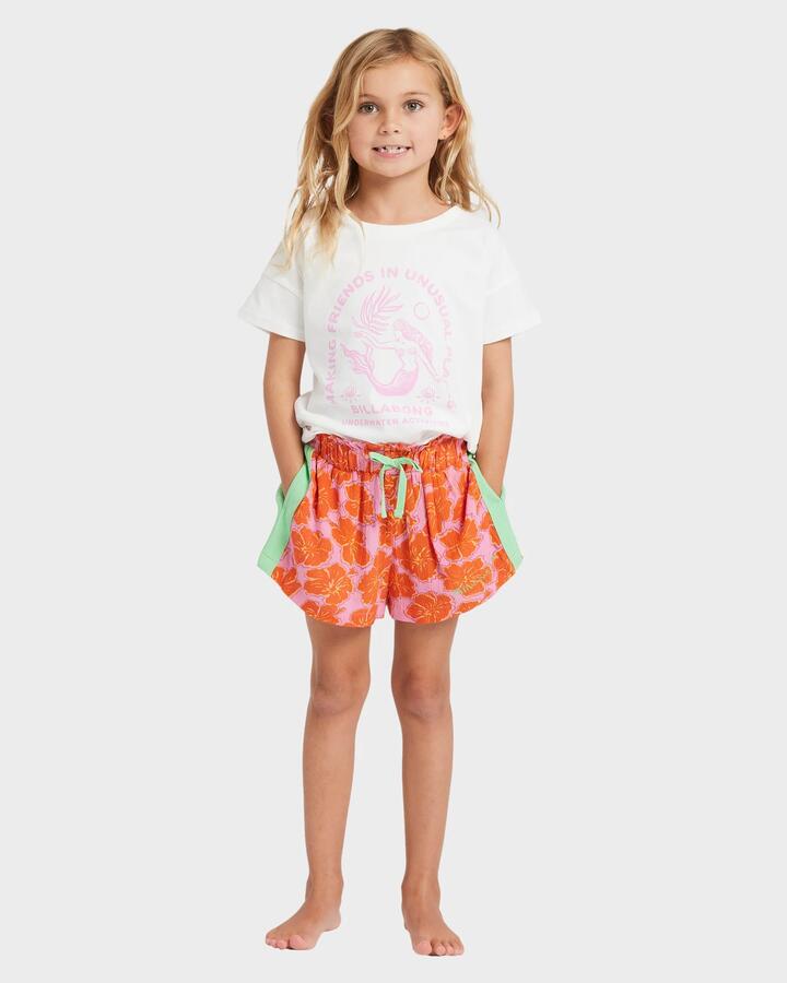 Image of a model wearing Shorts. Product name - Billabong Girls 2-7 Happy Hibiscus Elastic Waist Shorts Party Pink in Party Pink colour by brand - Billabong