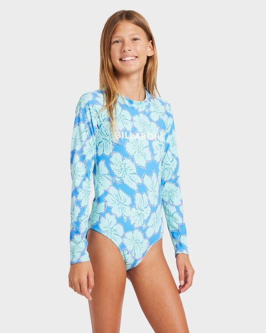 Image of a model wearing Tops. Productname: Billabong Girls 8-16 Long Sleeve Bodysuit Rash Vest Tidal Blue - in Tidal Blue colour by brand - Billabong