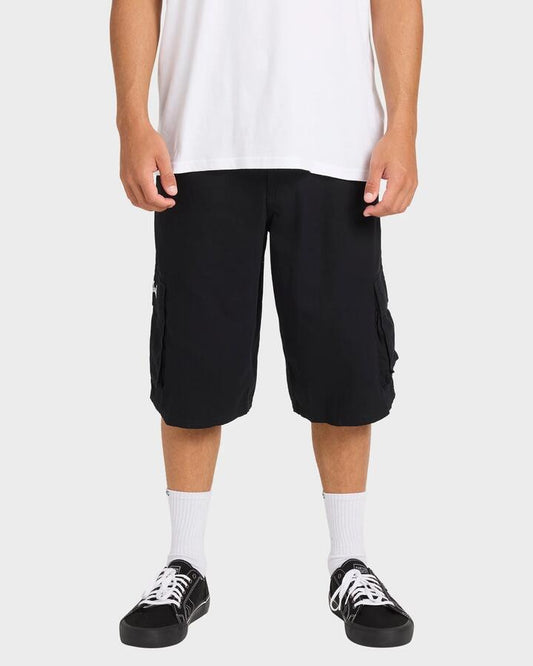Image of a model wearing Shorts. Productname: Billabong - Mens Script Cargo Shorts - Black - in Black colour by brand - Billabong
